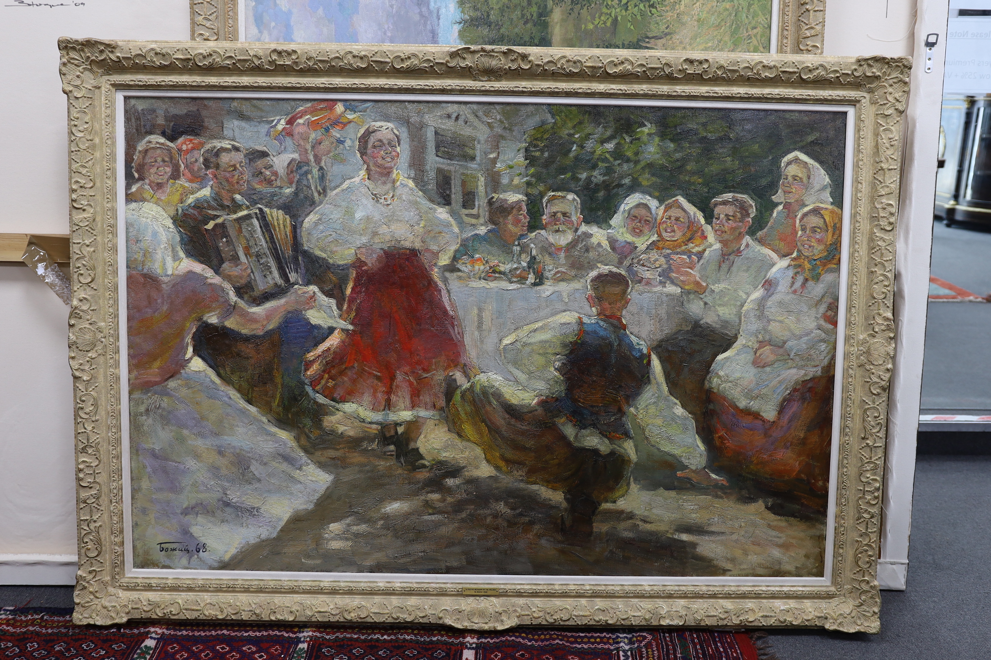 Michail Bozhij (Ukranian, 1911-1991), oil on canvas, ‘A Festive Occasion in the Village’, signed and dated 1968, 100 x 150cm